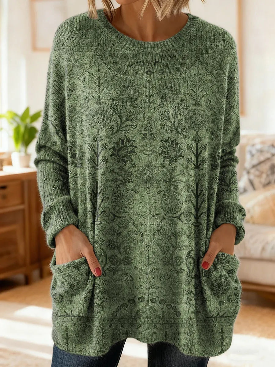 Elegancki i wygodny sweter kaszmirowy z kwiatowym nadrukiem, okrągłym dekoltem i kieszeniami.