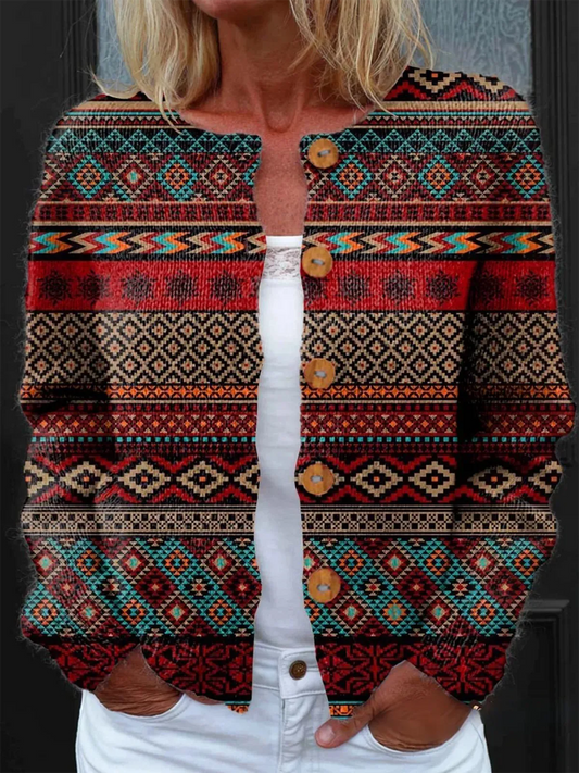 Elegancki i wygodny kardigan w kolorowe, nieregularne geometryczne wzory; swobodny i uniwersalny styl.