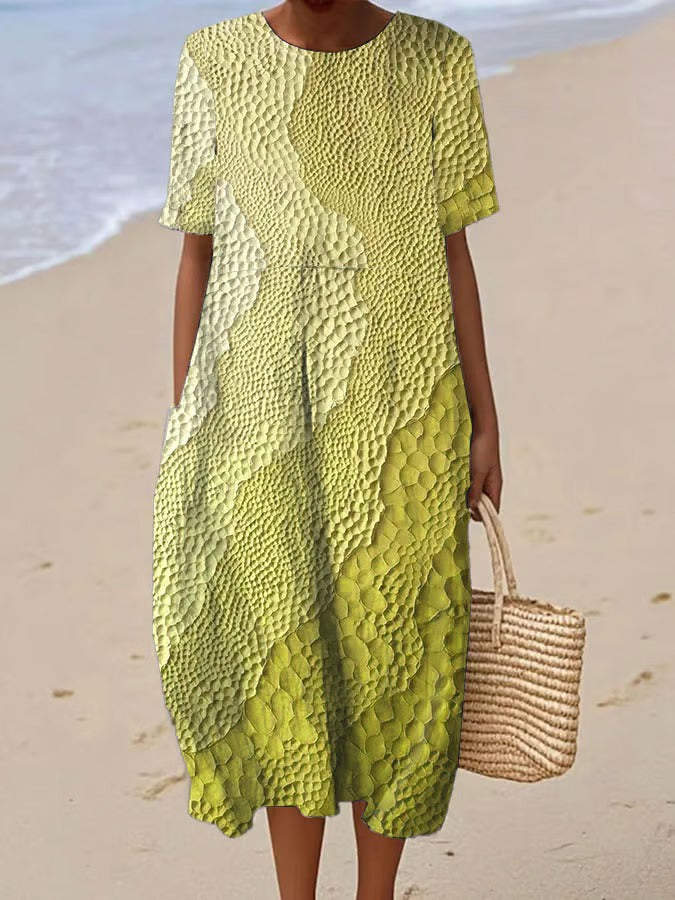 Elegancka i wygodna sukienka z krótkim rękawem w kolorowym gradiencie, lekka i zwiewna.