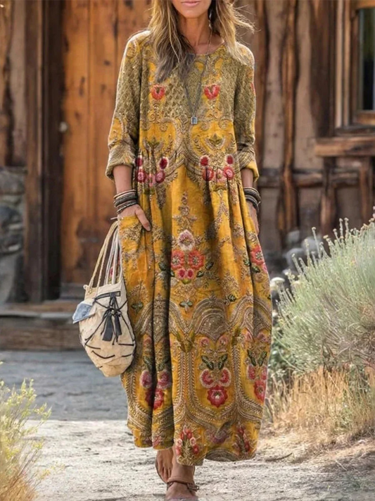 Elegancka i wygodna żółta sukienka ozdobiona pięknym kwiatowym wzorem i kieszeniami.