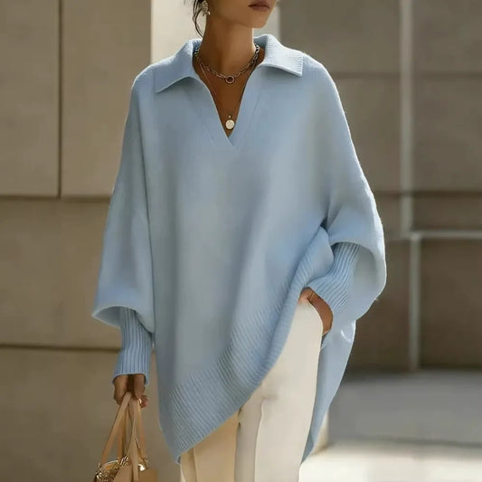 Ten elegancki, jednokolorowy sweter z kołnierzykiem ma dopasowane mankiety, które są zarówno uniwersalne, jak i wygodne 02