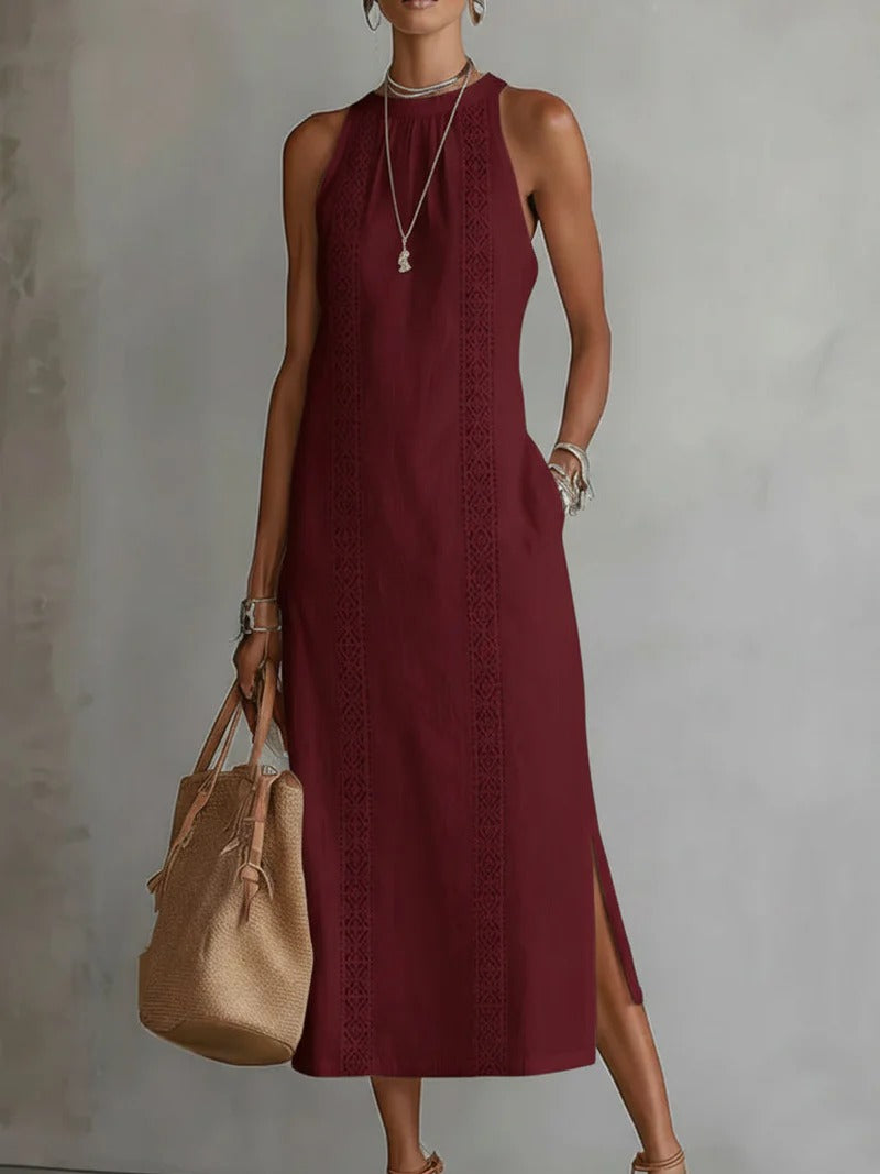 Elegancka i wygodna sukienka bez rękawów w jednolitym kolorze, która emanuje elegancją.