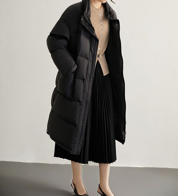 Elegancki i wygodny kardigan wykonany z miękkiej dzianiny, zapinany na guziki