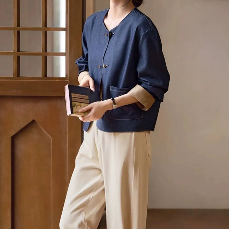 Elegancka i wygodna koszula z imitacji jeansu z brązowymi mankietami