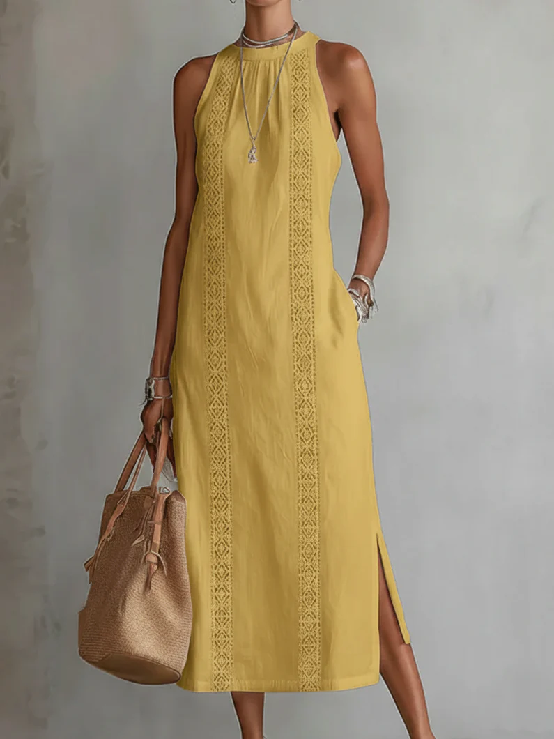 Elegancka i wygodna sukienka bez rękawów w jednolitym kolorze, która emanuje elegancją.