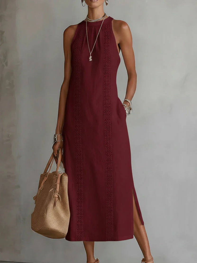 Elegancka i wygodna sukienka bez rękawów w jednolitym kolorze, która emanuje elegancją.