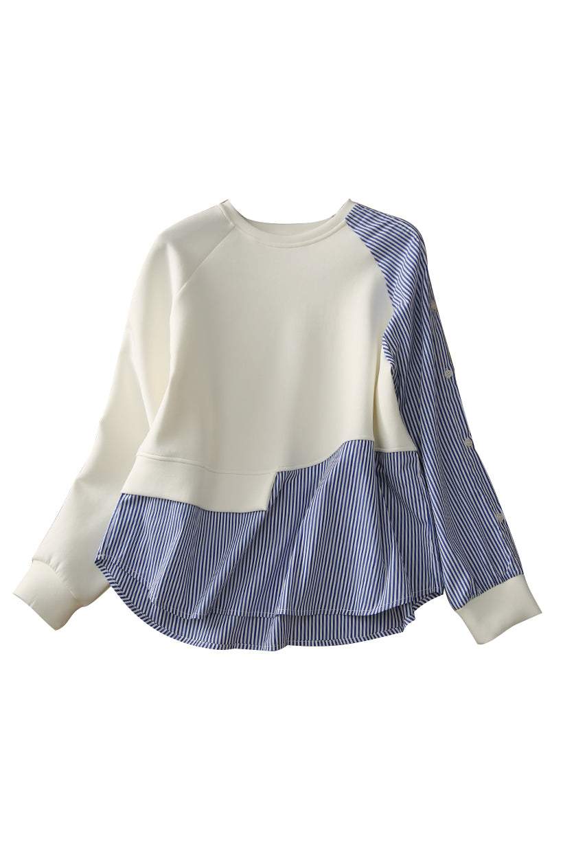 Ta wygodna, asymetryczna koszula w paski ma imitację dwuczęściowej konstrukcji.